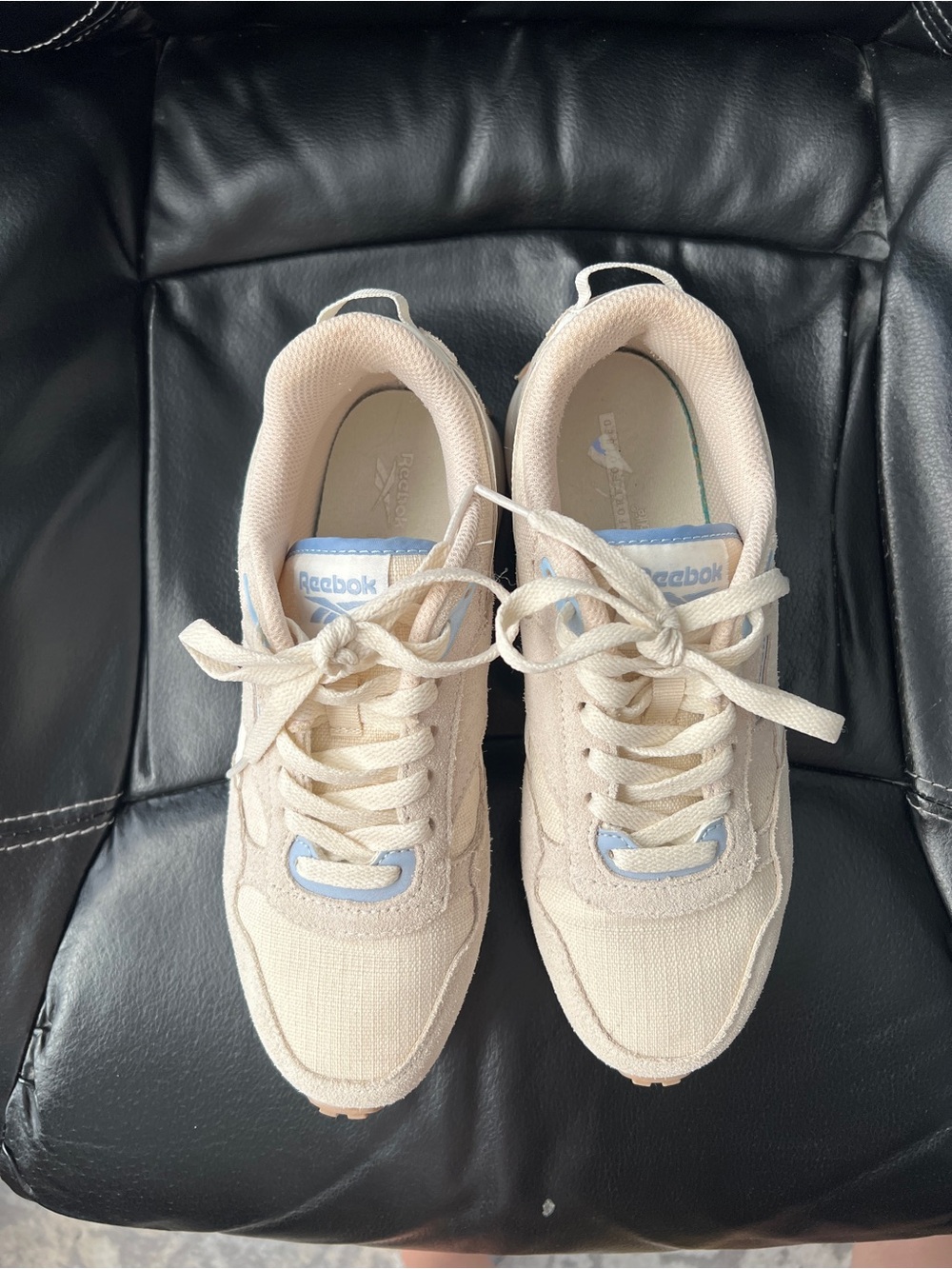 Reebok Women’s Cream Sneakers with Light Blue Trim